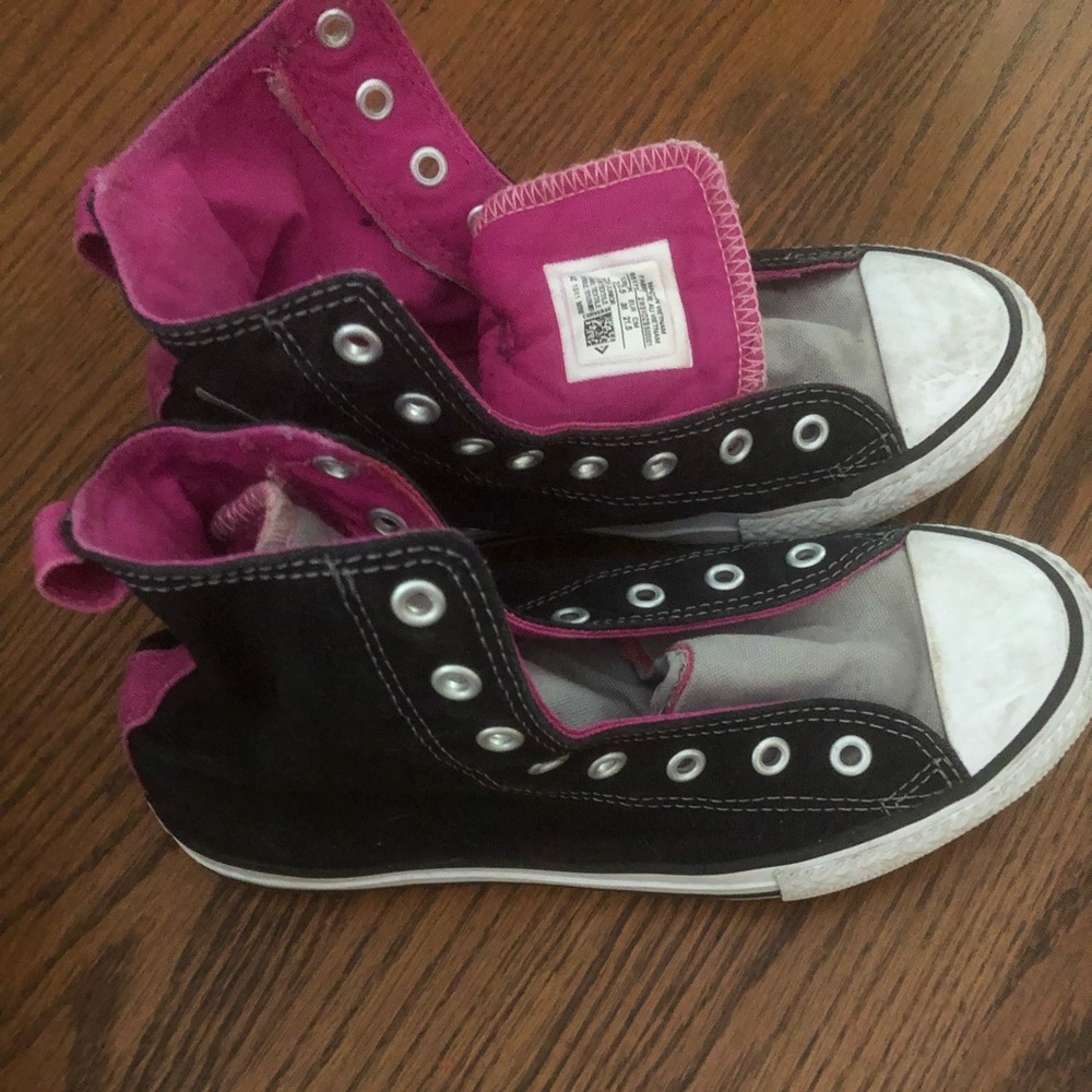 Kids converse high tops in size 3.  Black with pink accents.